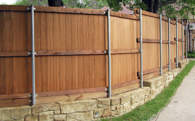 Cedar Fence with Stone Retaining Wall